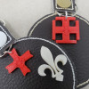 Porte-clés Médaillon en simili cuir brodé avec insigne 3D scout au dos