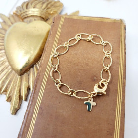 Bracelet religieux plaqué or d'une jolie maille corde et d'une croix