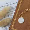 Collier religieux avec la croix de saint Benoit en nacre sur chaine