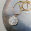 Collier religieux avec la croix de saint Benoit en nacre sur chaine